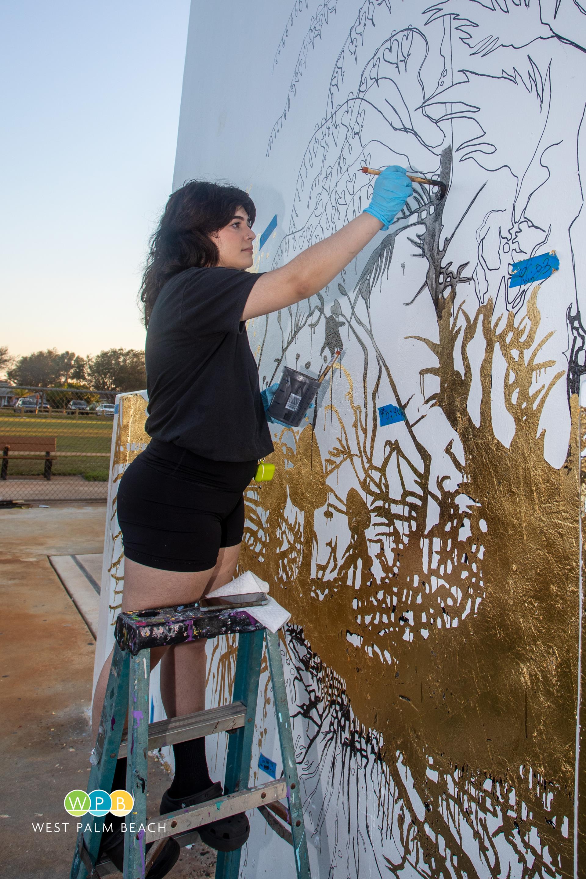 Working on the mural