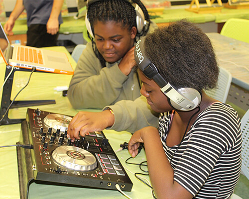 Teens working with turntable equipment