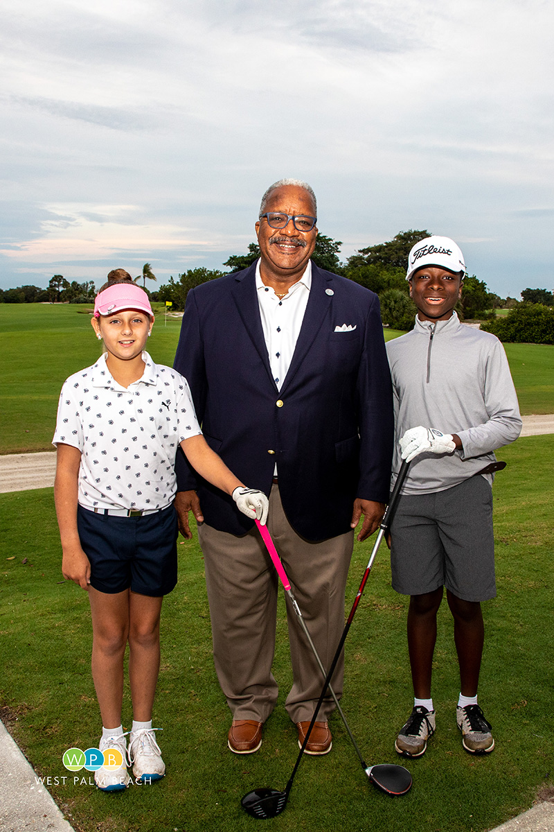 Mayor Keith A. James with The Park youth ambassadors Sara Valentine, left, and Jeurel Johnson,11