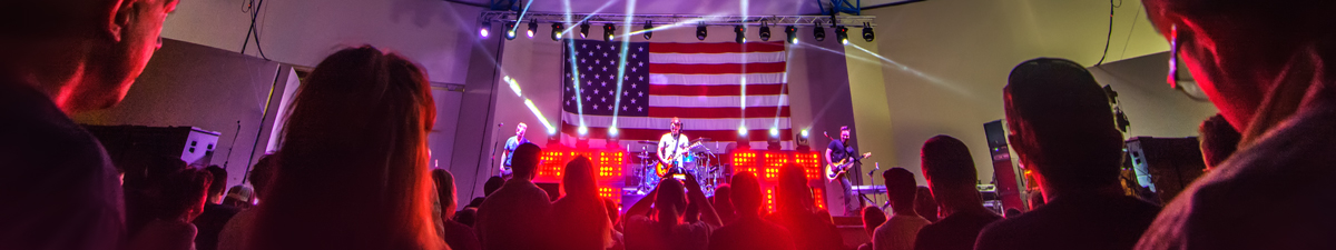 Photo of performer on Meyer Amphitheatre stage