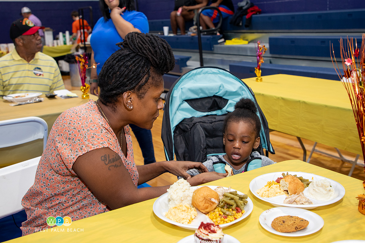 Mother-daughter enjoy a meal - a