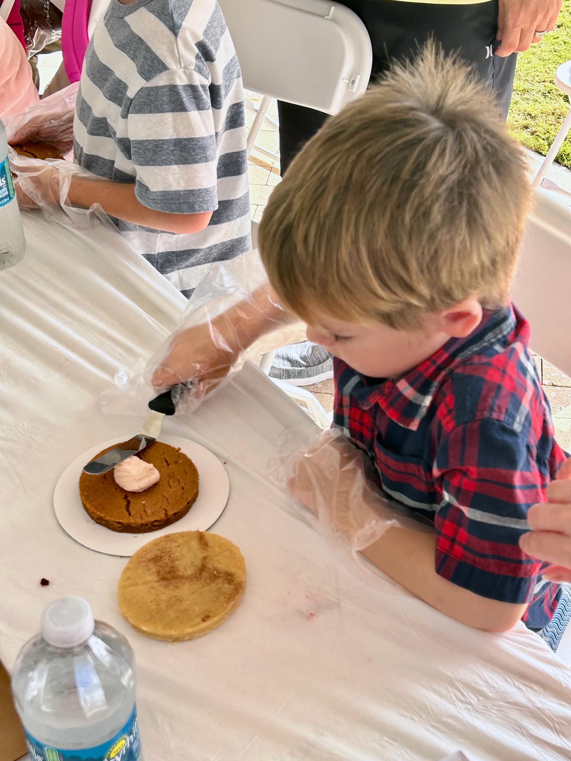 Youngster making his own cookie