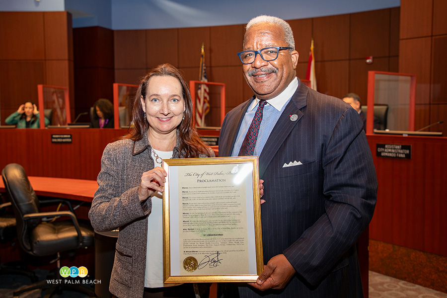 Sharon L'Herrou, 211 President and CEO, and Mayor Keith A. James - a