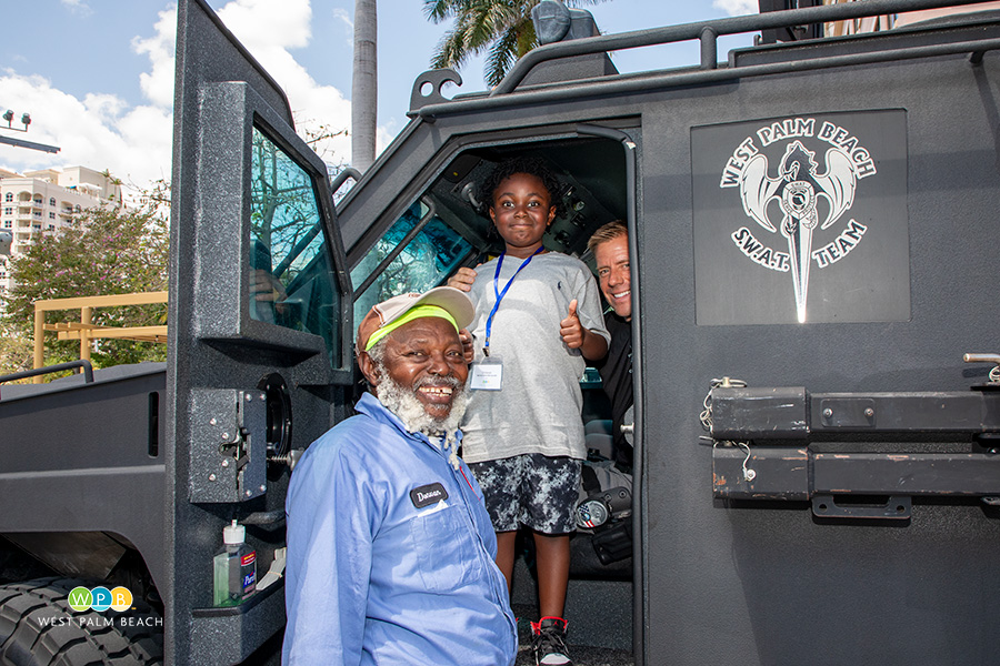 Donovan Williams and son with SWAT truck - a