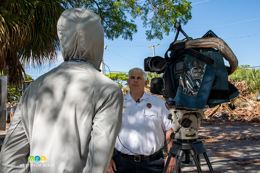 Chief Brent Bloomfield with media - a