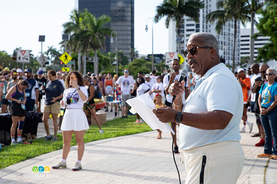 Mayor Keith A. James addresses a large crowd at the annual run - a