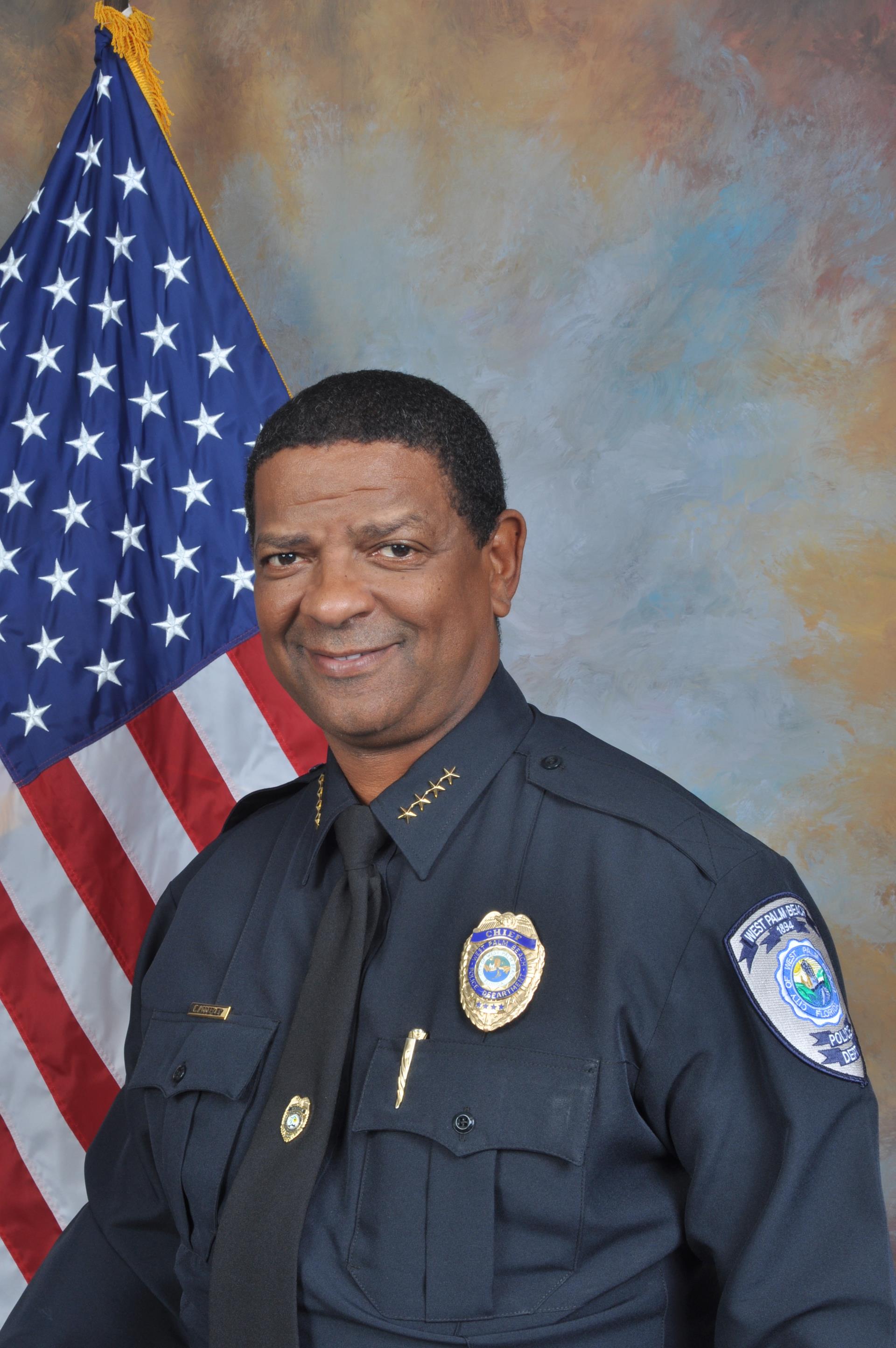 Photo of Chief Frank Adderley with American Flag