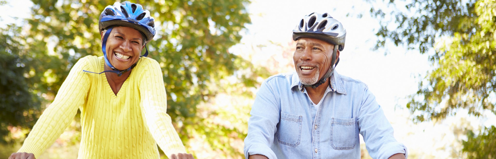 smiling couple riding bicycles