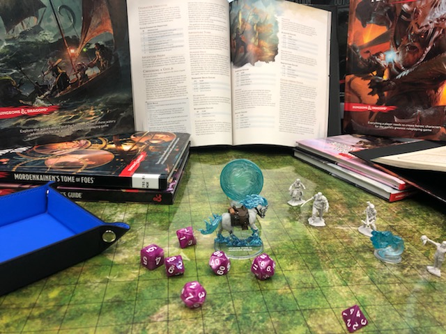 dungeons & dragons dice and books