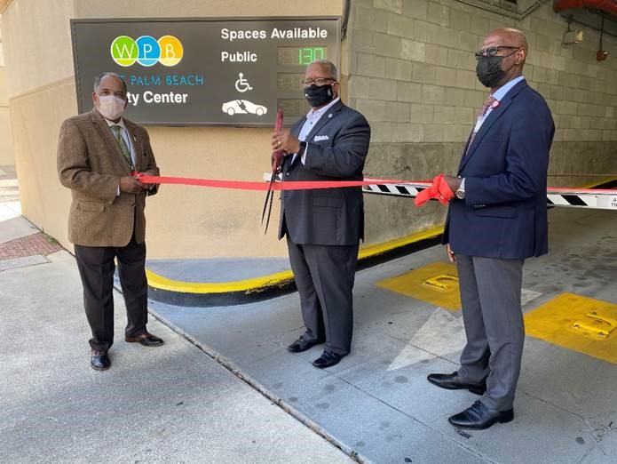 Parking Administrator Ed Davis, Mayor Keith A. James, and Public Safety Advisor Gregory Key Celebrate Improvements to City Garages with Ceremonial Ribbon Cutting