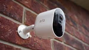 Photo of a security camera mounted on wall