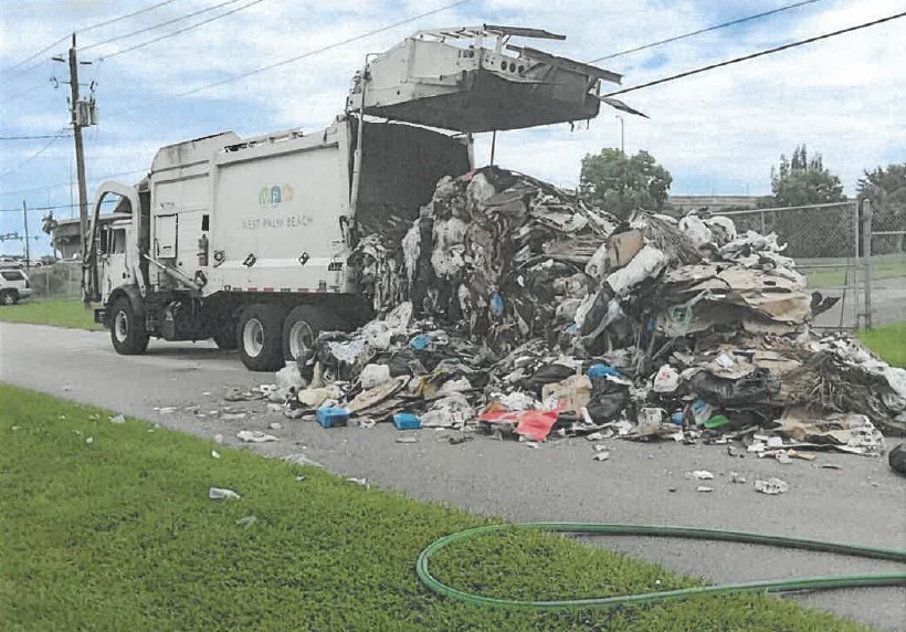 Workers dumped sanitation truck's content to prevent further damage 