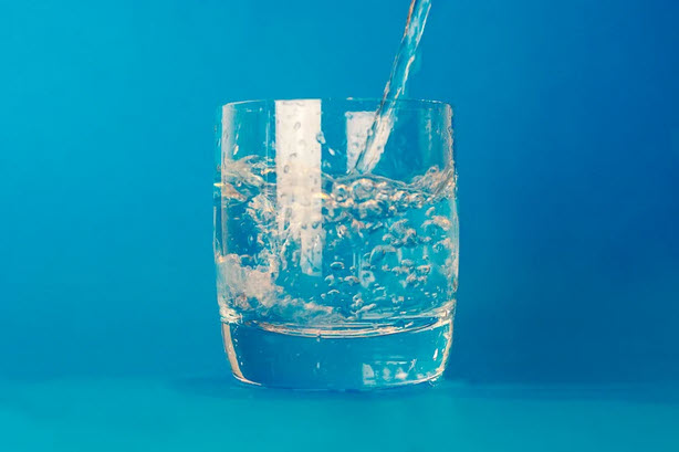 water being poured into glass