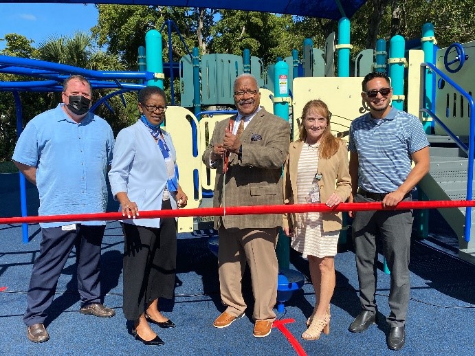 Dual Playground Ribbon Cuttings