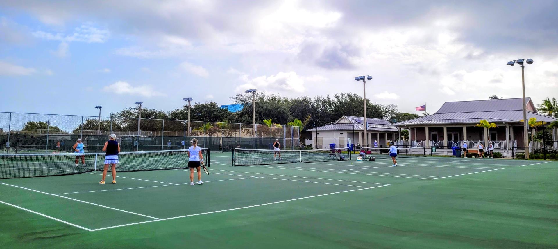 Women playing on South Olive Tennis Court