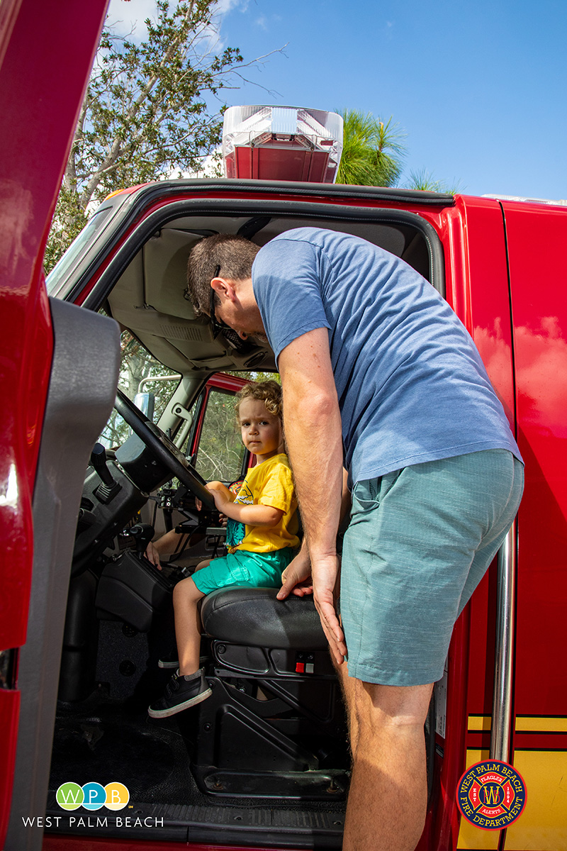 Roman Edelheit checks out ambulance with dad